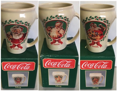 7066-3 € 37,50 coca cola mokken set van 3 kerstmokken met oor